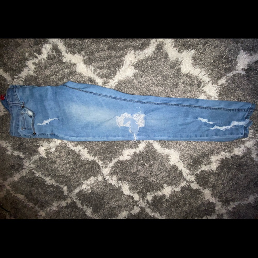 Light Wash Blue Ripped Jeans